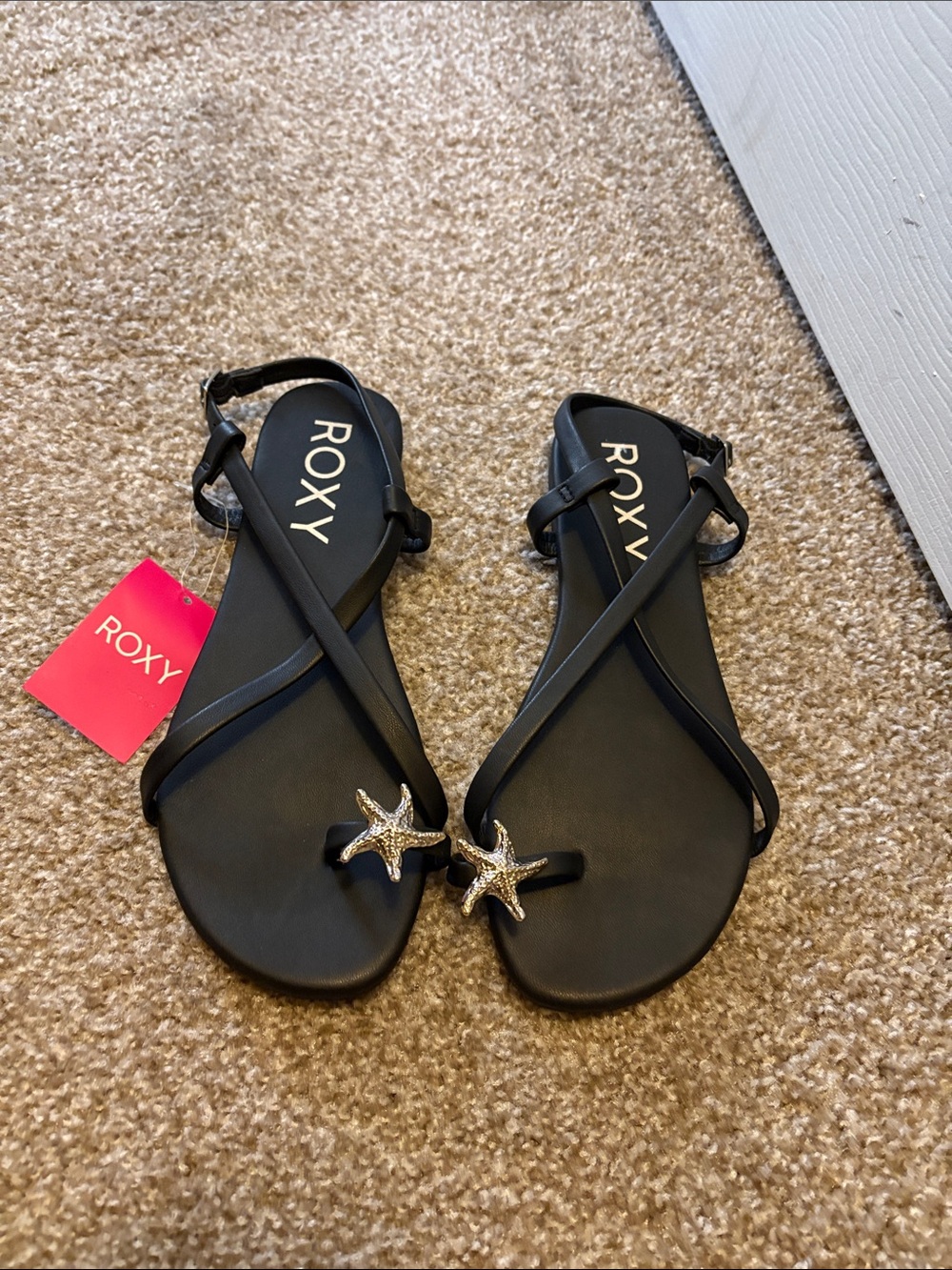 Roxy Black Strappy Sandals with Gold Starfish Accents